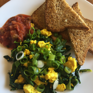 Photo example Tofu Scramble with greens and toast.