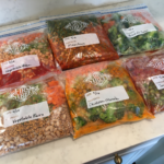 Photo example of 36 vegan freezer meals for $50 from Trader Joes groceries.