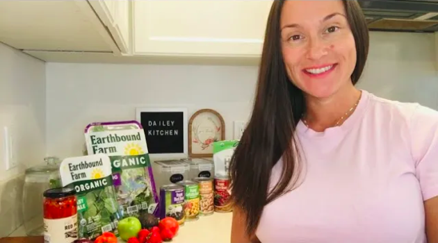 Photo of Veronica Dailey, host of Dailey Foods YouTube channel with some organic foods.