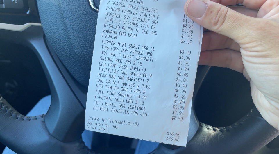Photo example of reciept from trader joes budget grocery haul and meal plan.